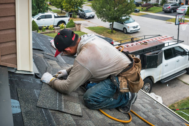 Professional Gutter Repair And Installation technician working in Plainville, CT